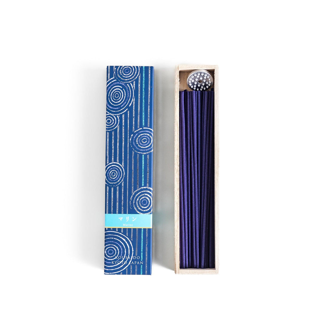 Japanese marine incense sticks in a wooden box with a deep blue patterned sleeve inspired by the ocean, made in Kyoto