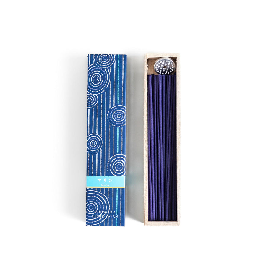 Japanese marine incense sticks in a wooden box with a deep blue patterned sleeve inspired by the ocean, made in Kyoto