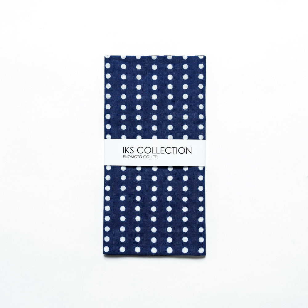Navy tenugui folded neatly, with a product sleeve for display.