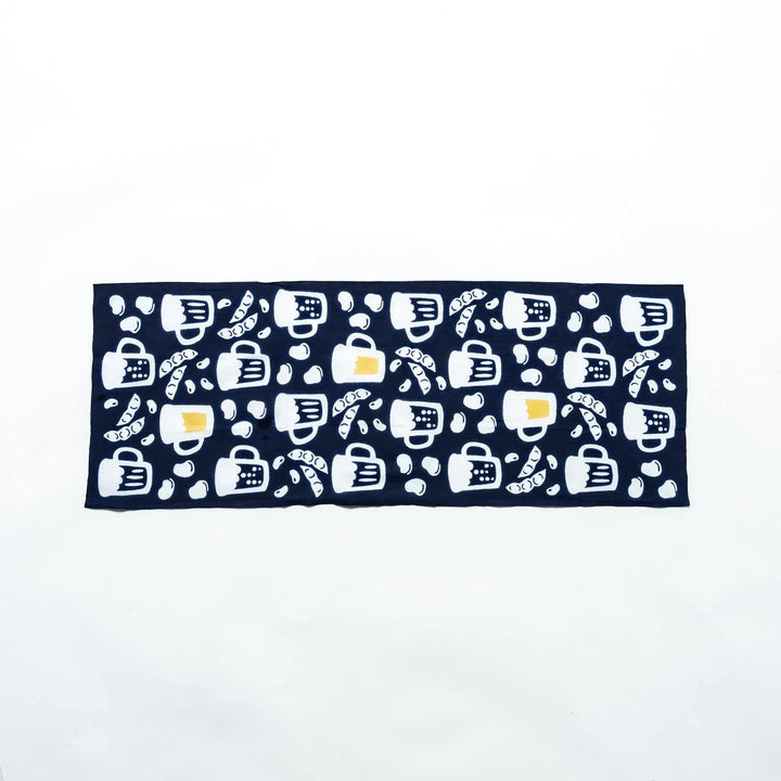 Fully extended dark navy tenugui showcasing beer mugs, soybeans, and edamame patterns in white and yellow.