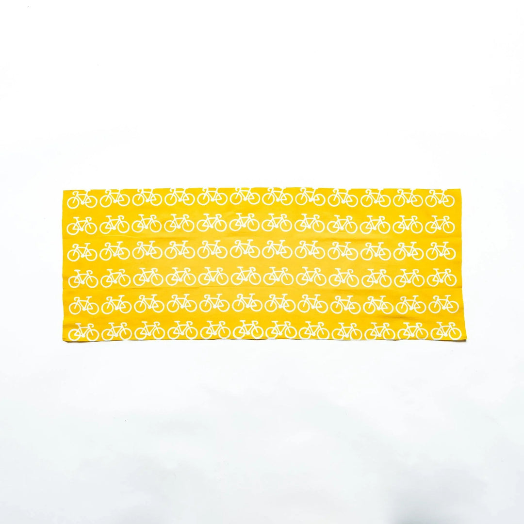 The bicycle-patterned tenugui spread out flat to display its overall design.