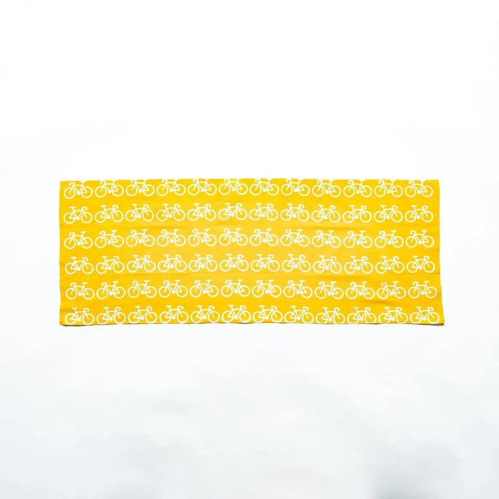 The bicycle-patterned tenugui spread out flat to display its overall design.