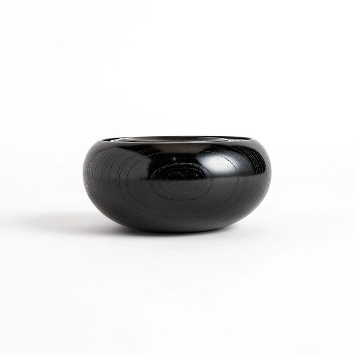 Black lacquer Oryoki bowl set with large serving bowl three medium bowls and small plates glossy finish.