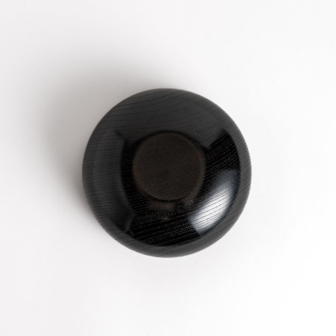 Black lacquer Oryoki bowl set with large serving bowl three medium bowls and small plates glossy finish.