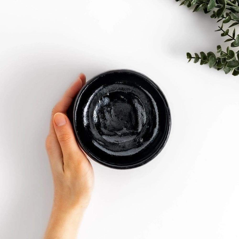 Turquoise crackle-glazed teapot with floral patterns and gold-accented spout, blending elegance and craftsmanship.