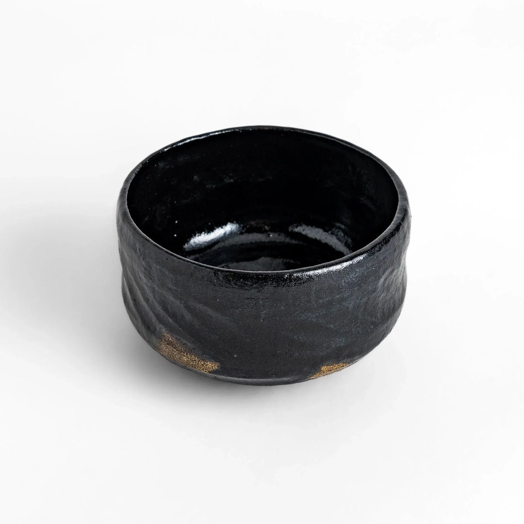 Turquoise crackle-glazed teapot with floral patterns and gold-accented spout, blending elegance and craftsmanship.