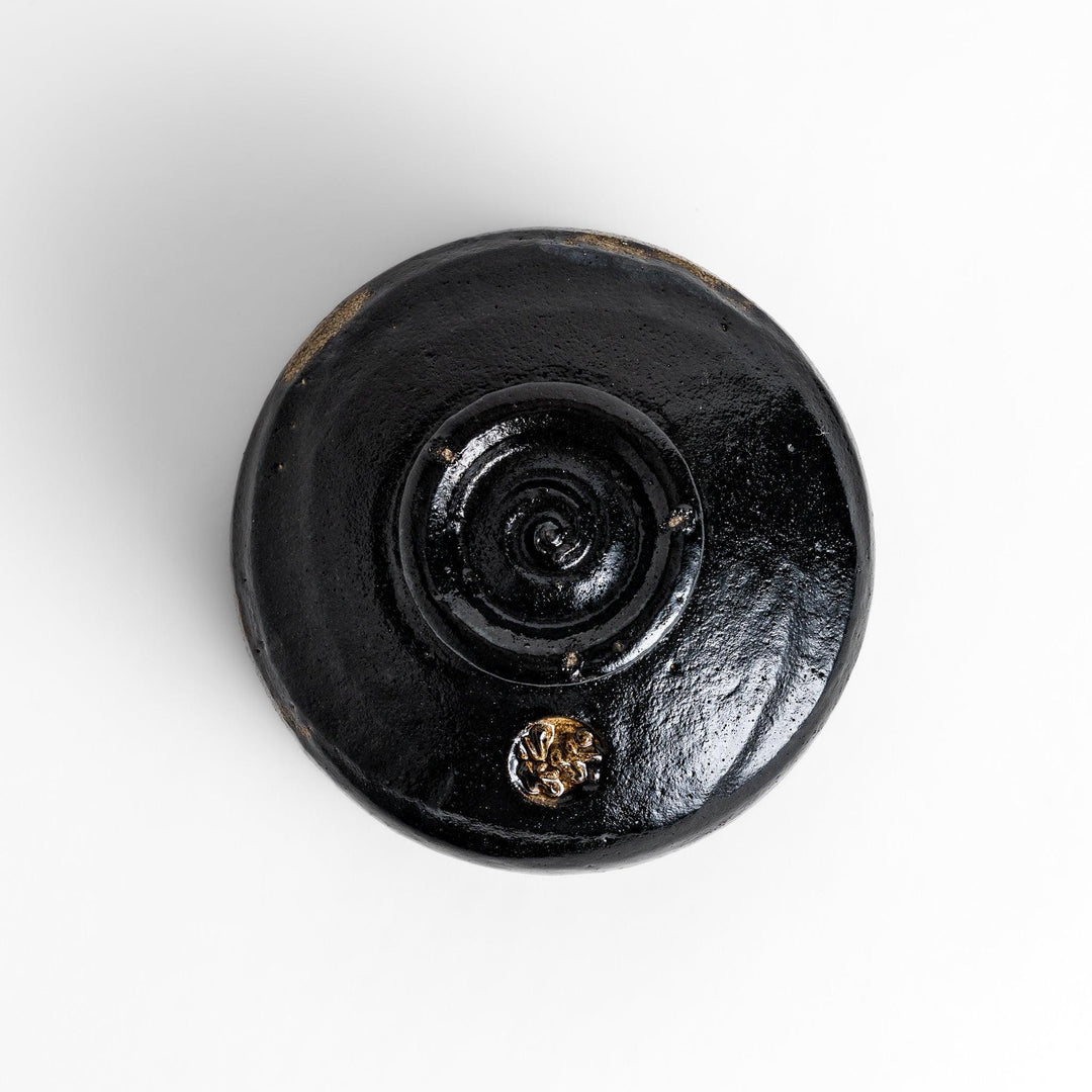 Turquoise crackle-glazed teapot with floral patterns and gold-accented spout, blending elegance and craftsmanship.