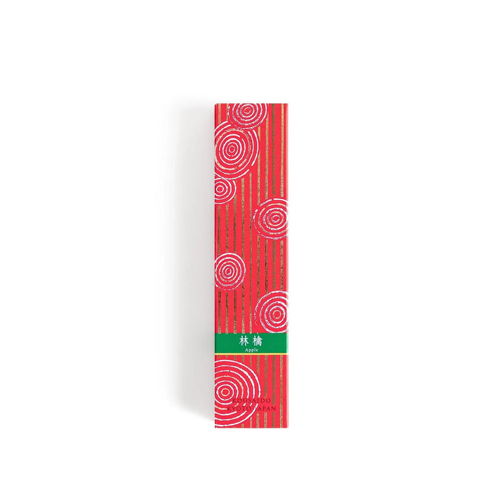 Japanese Apple incense sticks in a vivid red patterned box with wooden holder, offering a crisp and fruity aroma from Kyoto