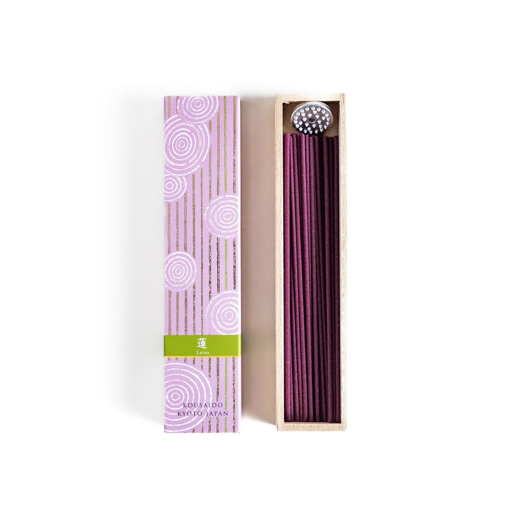 Japanese lavender incense in wooden box with purple sticks and white circle pattern on soft packaging.