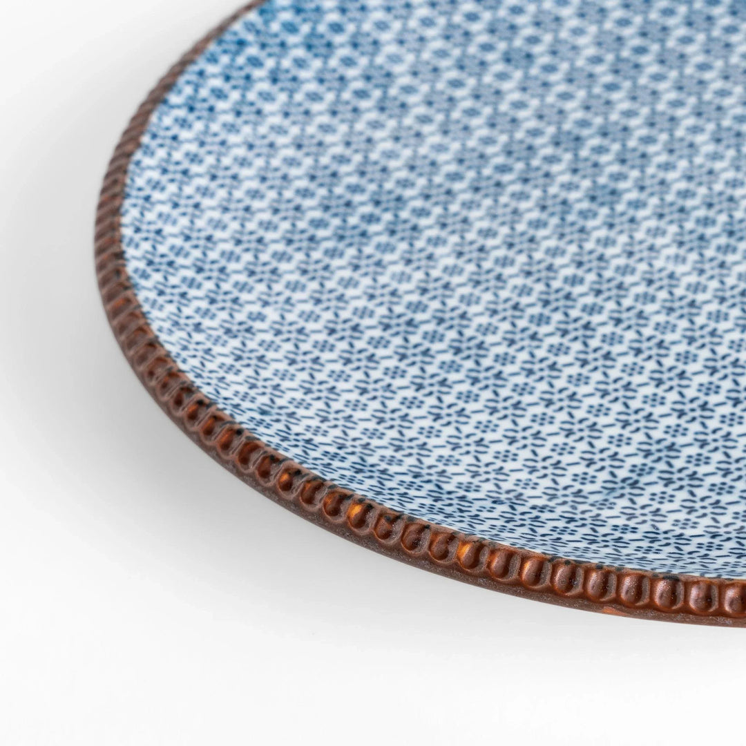 Blue and gray Japanese Sesame Dinner Plate with subtle textured glaze and modern minimalist tableware design.