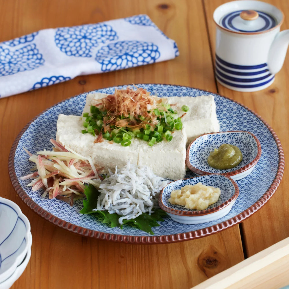 Blue and gray Japanese Sesame Dinner Plate with subtle textured glaze and modern minimalist tableware design.