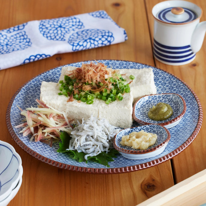 Blue and gray Japanese Sesame Dinner Plate with subtle textured glaze and modern minimalist tableware design.
