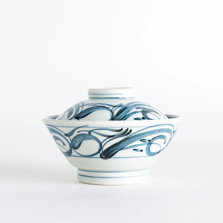 Blue Arabesque Tobe style donburi bowl with lid showcasing intricate swirling patterns and a smooth finish.