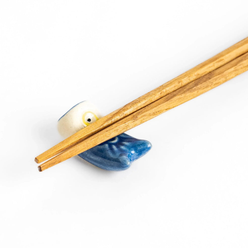 Blue carp streamer chopstick rest with hand-painted details, celebrating a traditional Japanese festive design.