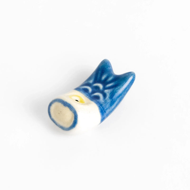 Blue carp streamer chopstick rest with hand-painted details, celebrating a traditional Japanese festive design.