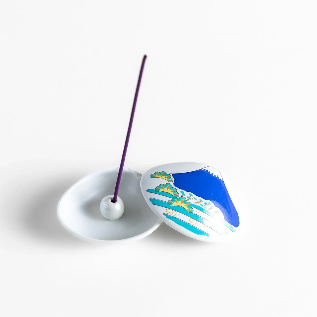 Blue Mount Fuji Shell Incense Holder with vivid Fuji design, gold accents, and secure holder for elegant incense display.