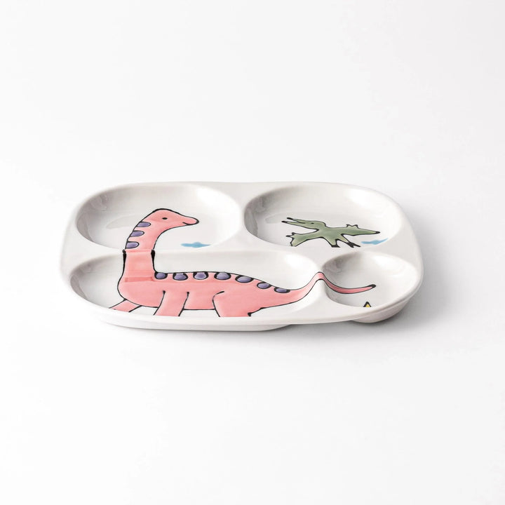 Japanese ceramic kids dinnerware set with pink dinosaur and green pterodactyl design including plate bowl and mug.