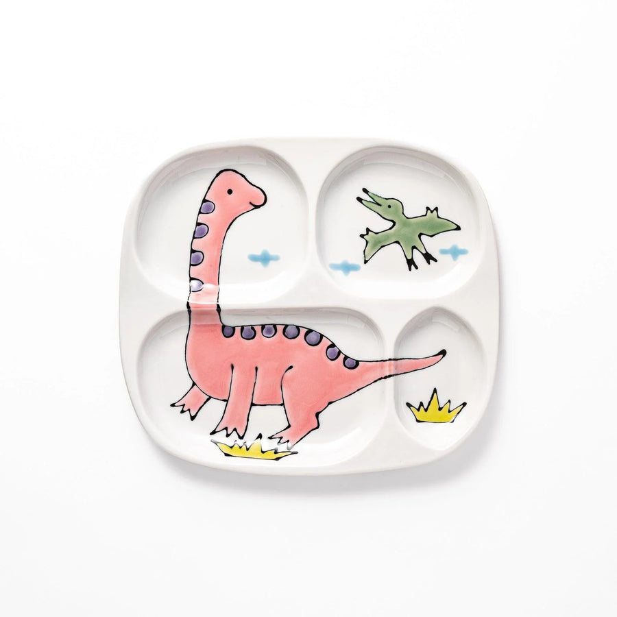 Japanese ceramic kids plate with cute pink dinosaur and green pterodactyl design featuring four divided sections.