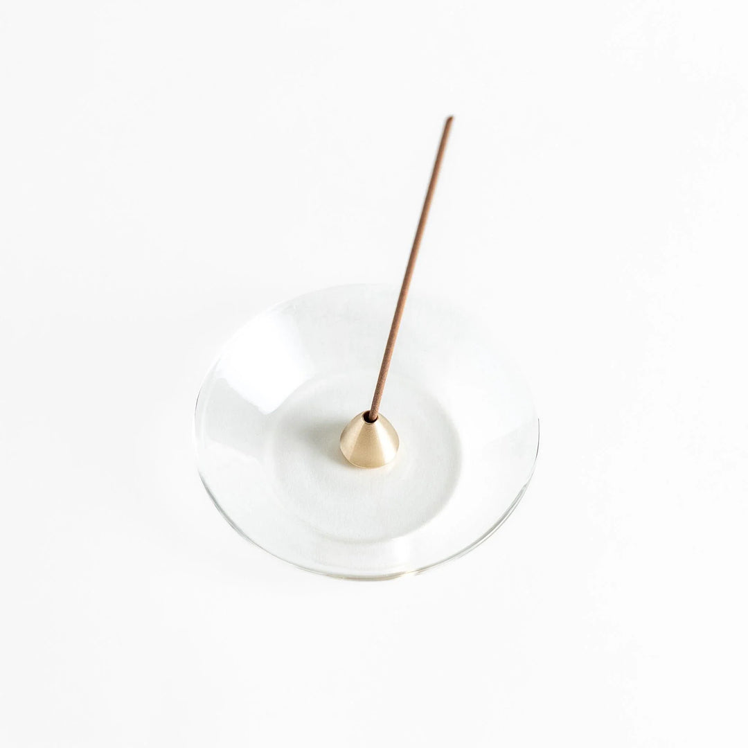 Modern glass Incense Holder with brass accent, a stylish way to enjoy your favorite scents.