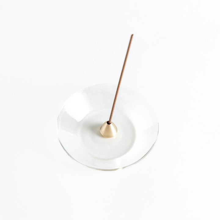 Modern glass Incense Holder with brass accent, a stylish way to enjoy your favorite scents.