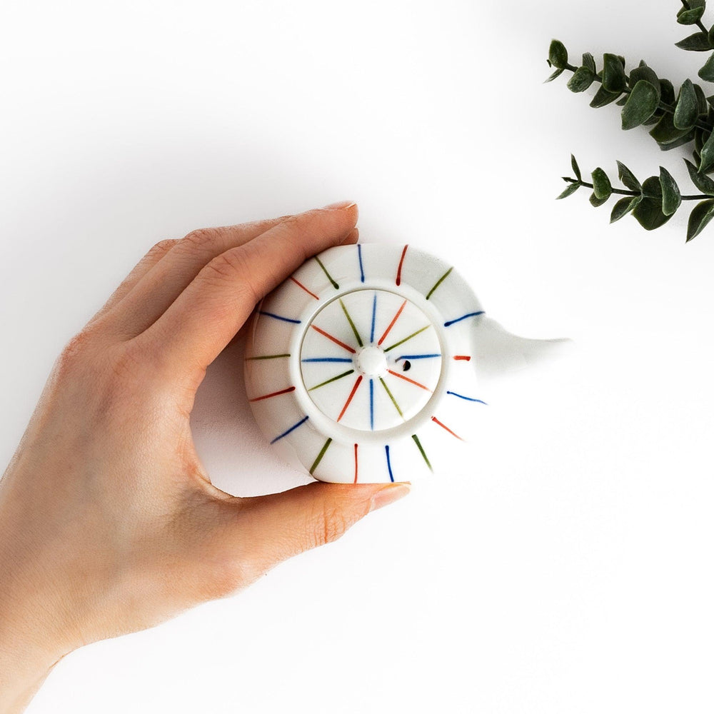 Brocade Striped soy sauce dispenser with red, blue, and green stripes, combining modern and traditional design.