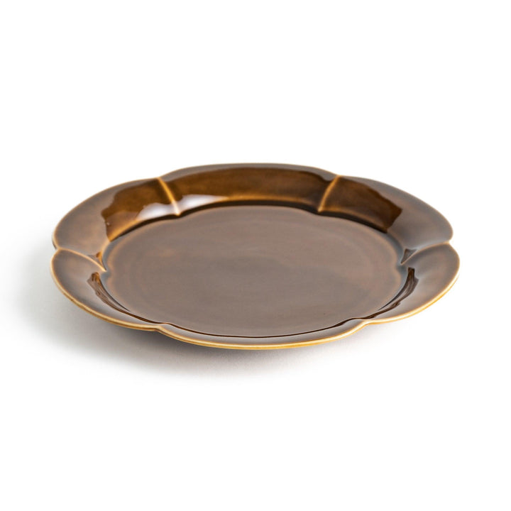 Earthy tones of olive, caramel, or off-white salad plate, with a soft, rounded shape and subtle color variations.