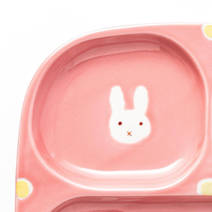 Bunny-themed kids’ plate with four sections and pink and yellow accents, perfect for fun, tidy meals.