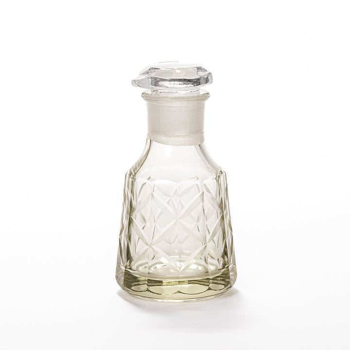 Elegant soy sauce dispenser with a celestial star-patterned design and smooth pour spout.