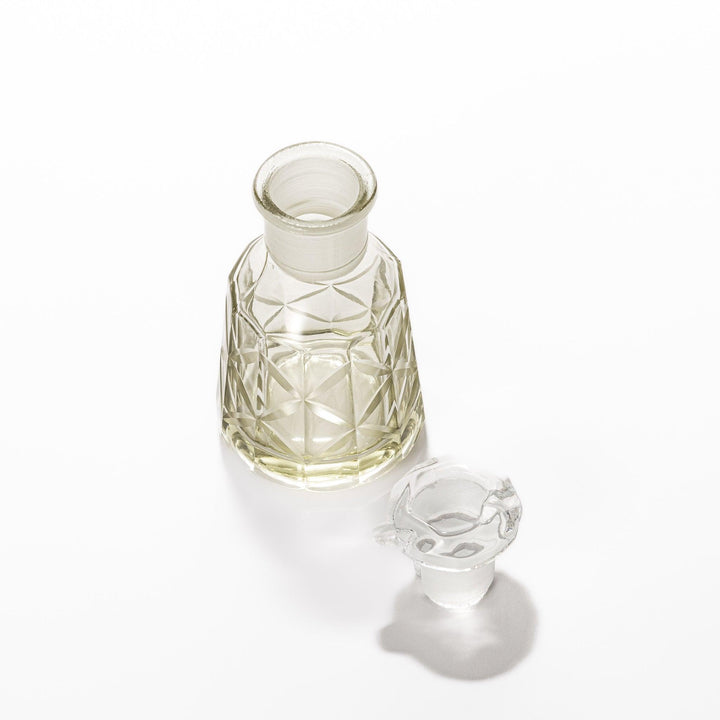 Elegant soy sauce dispenser with a celestial star-patterned design and smooth pour spout.