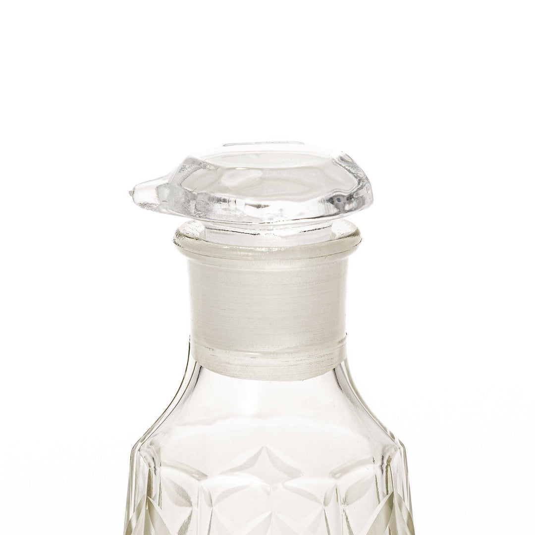 Elegant soy sauce dispenser with a celestial star-patterned design and smooth pour spout.