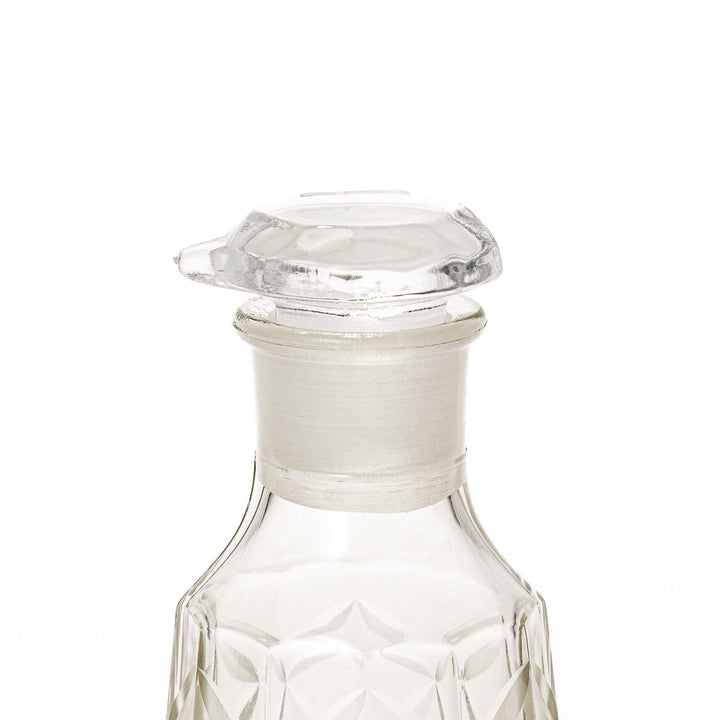Elegant soy sauce dispenser with a celestial star-patterned design and smooth pour spout.