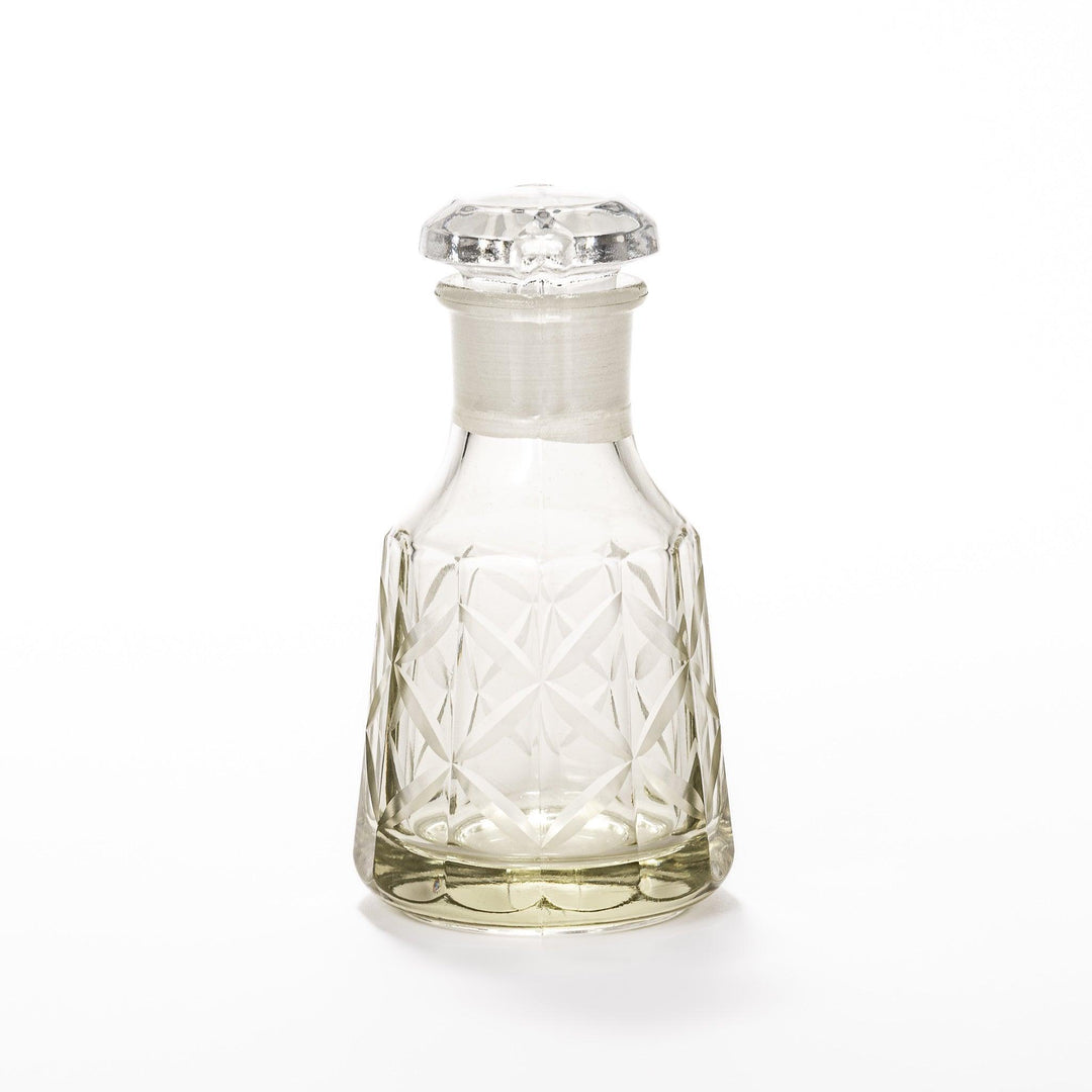 Elegant soy sauce dispenser with a celestial star-patterned design and smooth pour spout.