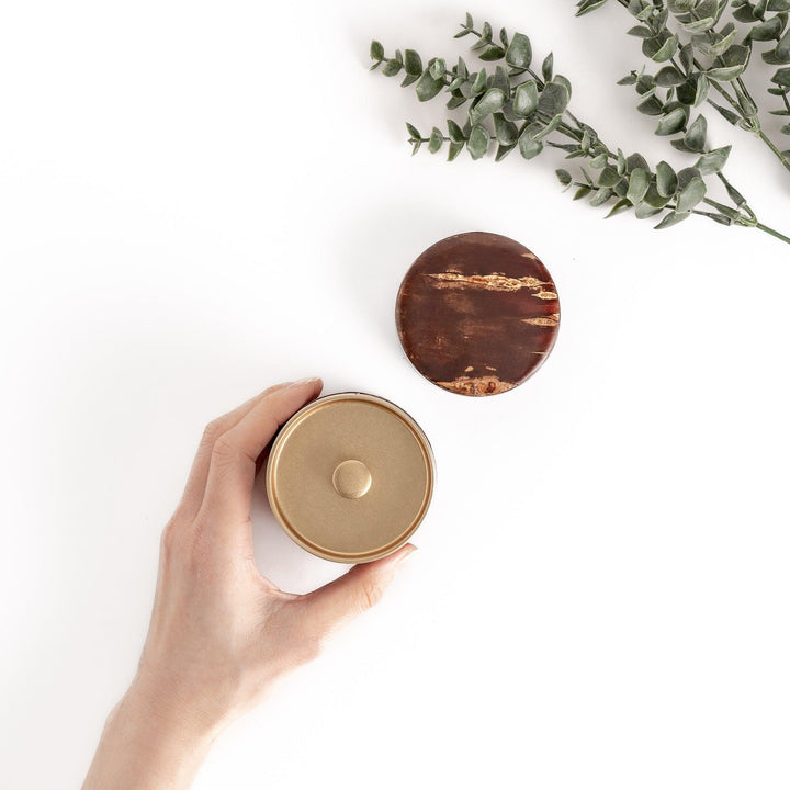 Cherry bark tea canister with rich dark brown finish and visible grain for preserving loose leaf tea.