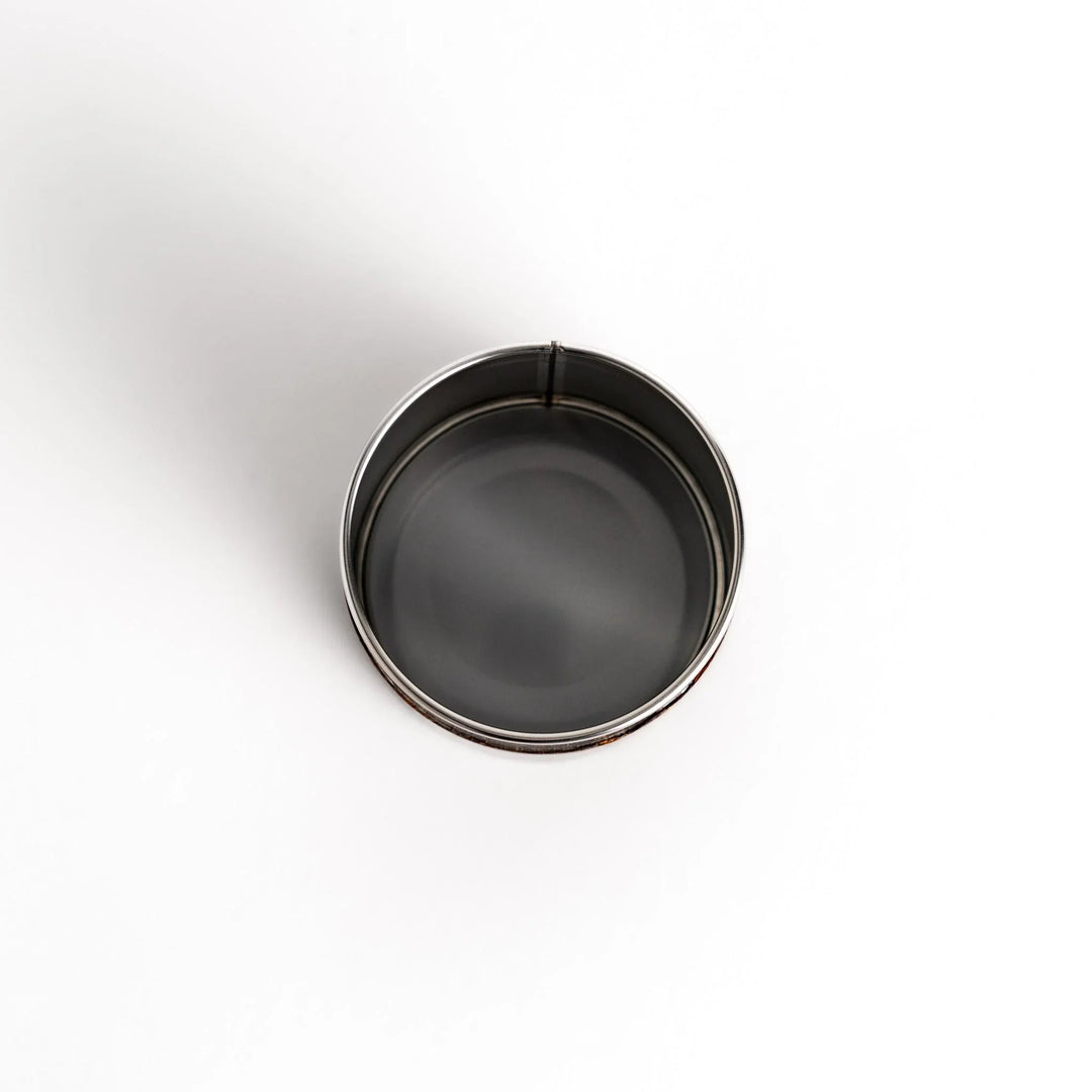 Cherry bark tea canister with rich dark brown finish and visible grain for preserving loose leaf tea.