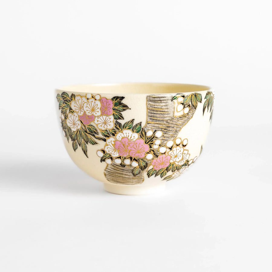 Cherry Blossom Matcha Bowl with delicate floral motifs and gold details, ideal for elegant and serene tea enjoyment.