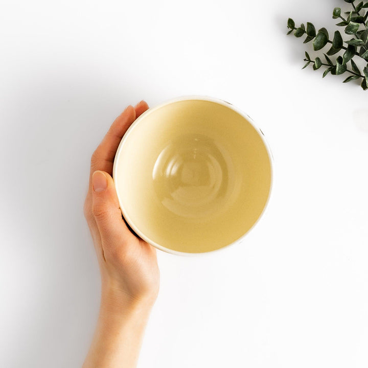 Cherry Blossom Matcha Bowl with delicate floral motifs and gold details, ideal for elegant and serene tea enjoyment.