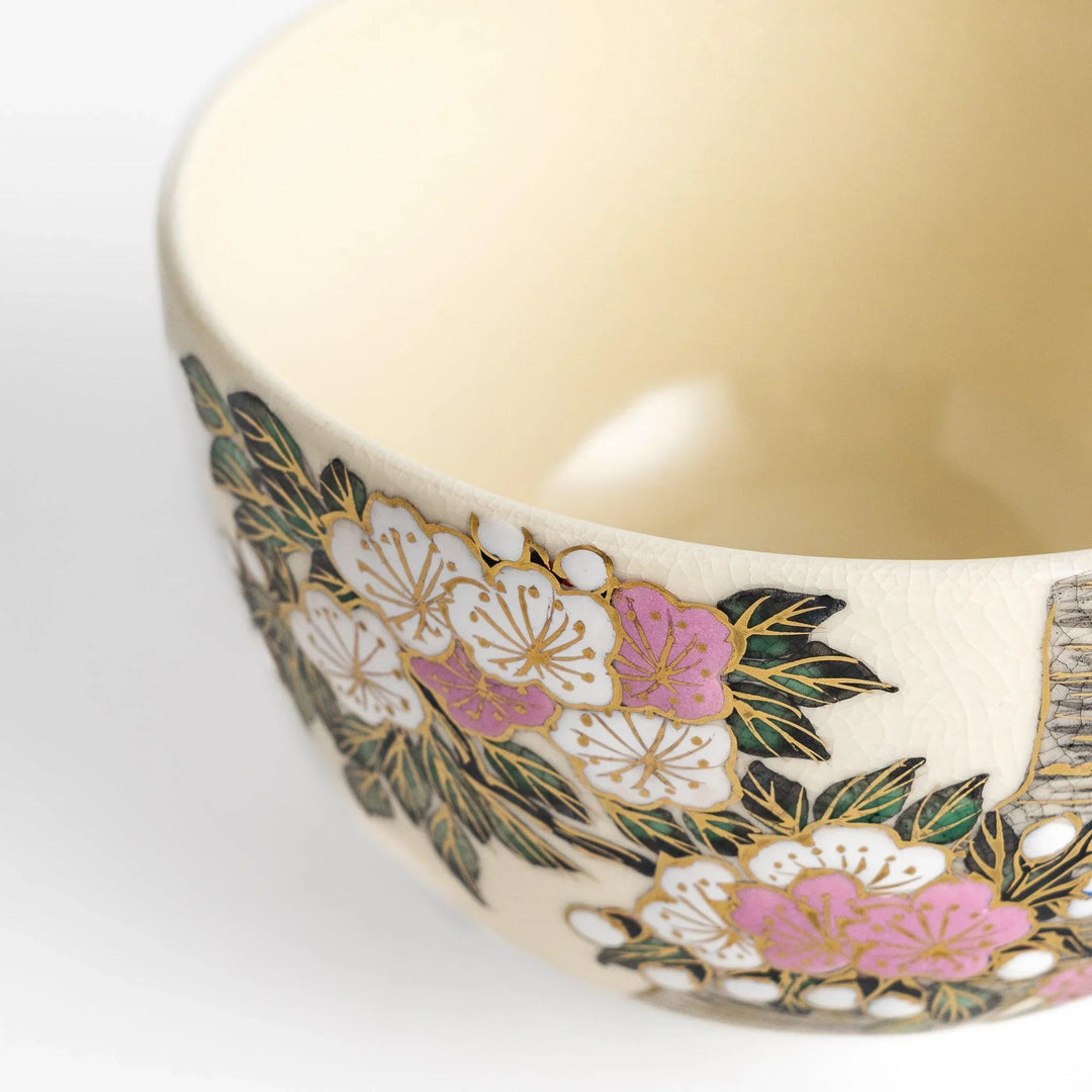 Cherry Blossom Matcha Bowl with delicate floral motifs and gold details, ideal for elegant and serene tea enjoyment.