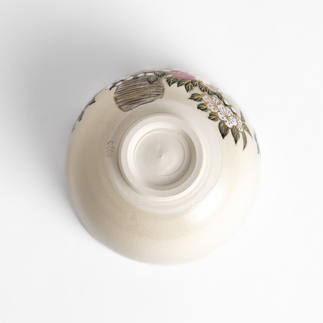 Cherry Blossom Matcha Bowl with delicate floral motifs and gold details, ideal for elegant and serene tea enjoyment.