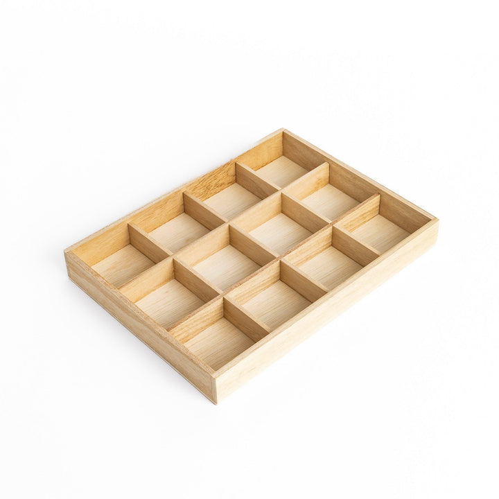 Wooden chopstick rest organizer with 12 sections, ideal for storing and displaying various chopstick rests.