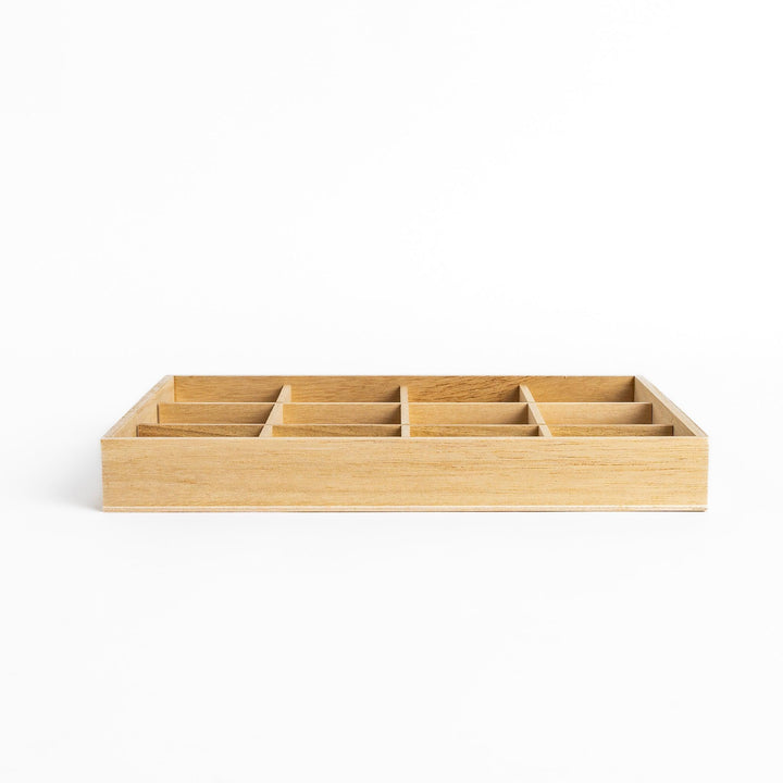 Wooden chopstick rest organizer with 12 sections, ideal for storing and displaying various chopstick rests.