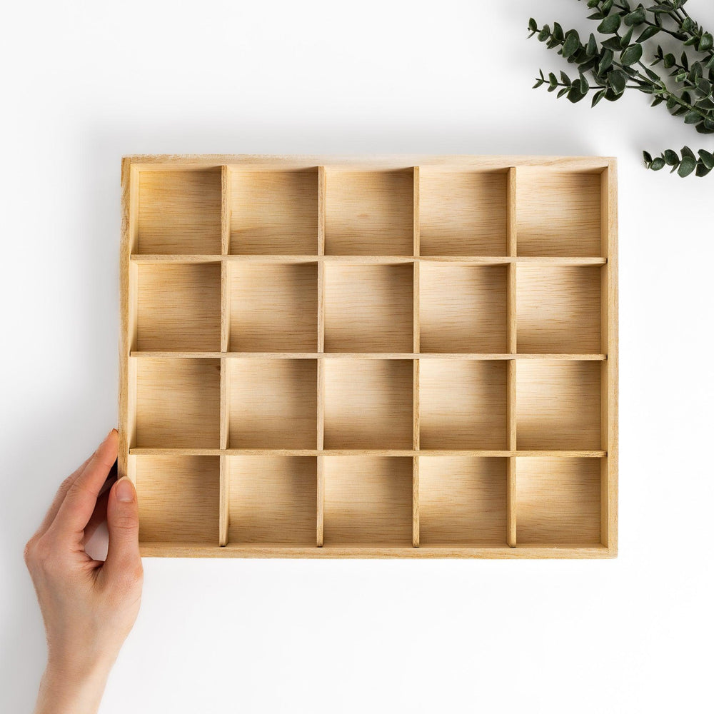 A wooden organizer designed to hold 20 charming chopstick rests, keeping them neatly arranged and easily accessible.