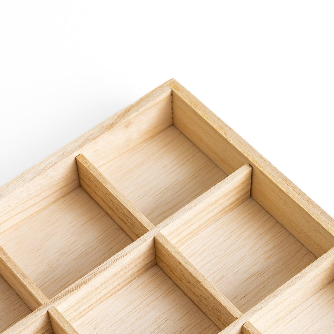 A wooden organizer designed to hold 20 charming chopstick rests, keeping them neatly arranged and easily accessible.