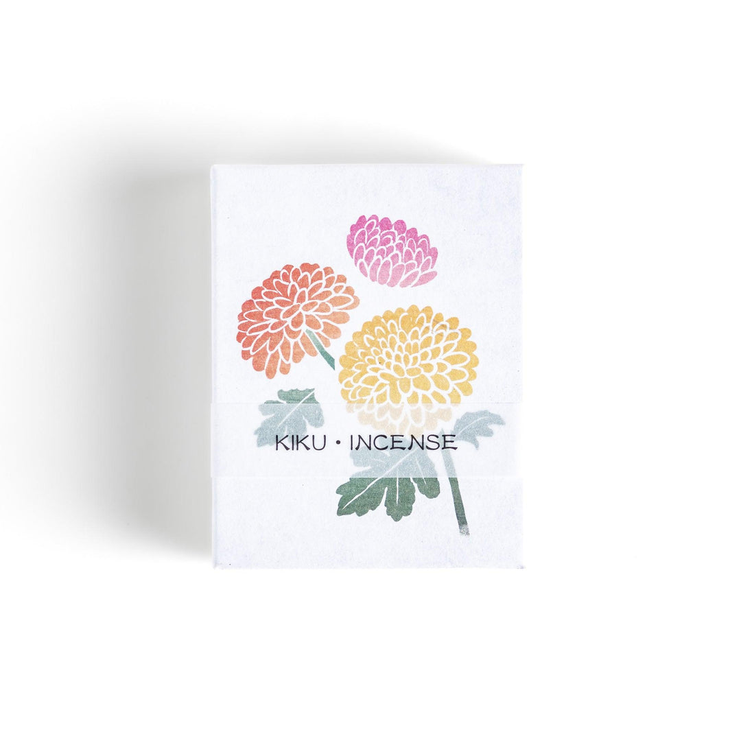 Incense with brown sticks in a chrysanthemum box, offering a refined floral aroma for a calm setting.