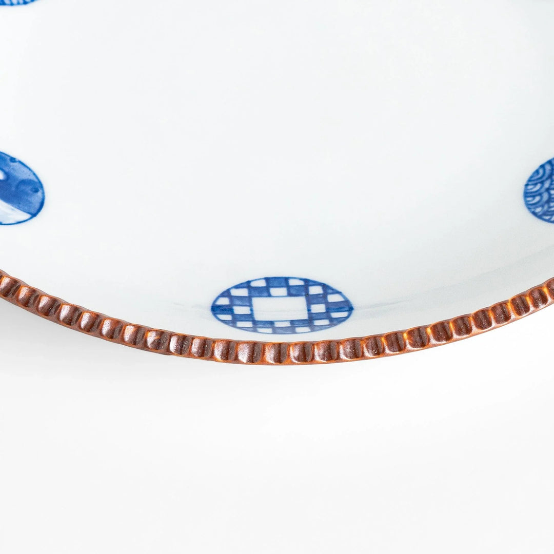 Elegant ceramic salad plate featuring a classic blue and white pattern, adding a touch of sophistication to your table.