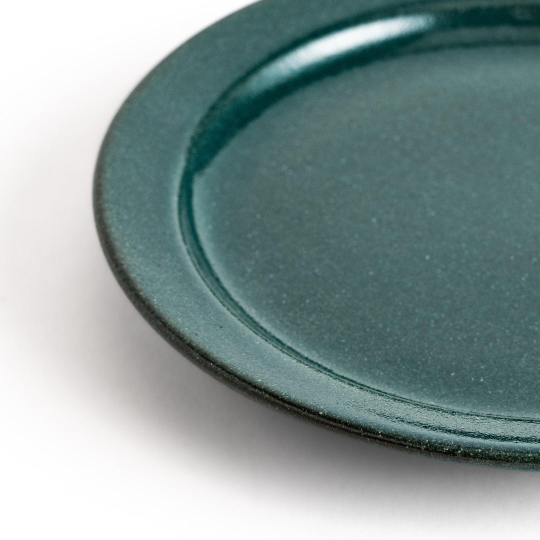 Color Harmony dessert plate featuring glossy multicolor design in blue red green yellow white and black for vibrant dining.