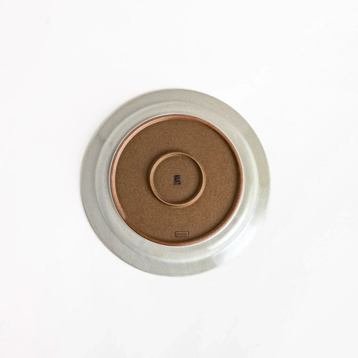 White ceramic dinner plate with a glossy finish, offering a clean and timeless design perfect for various table settings.