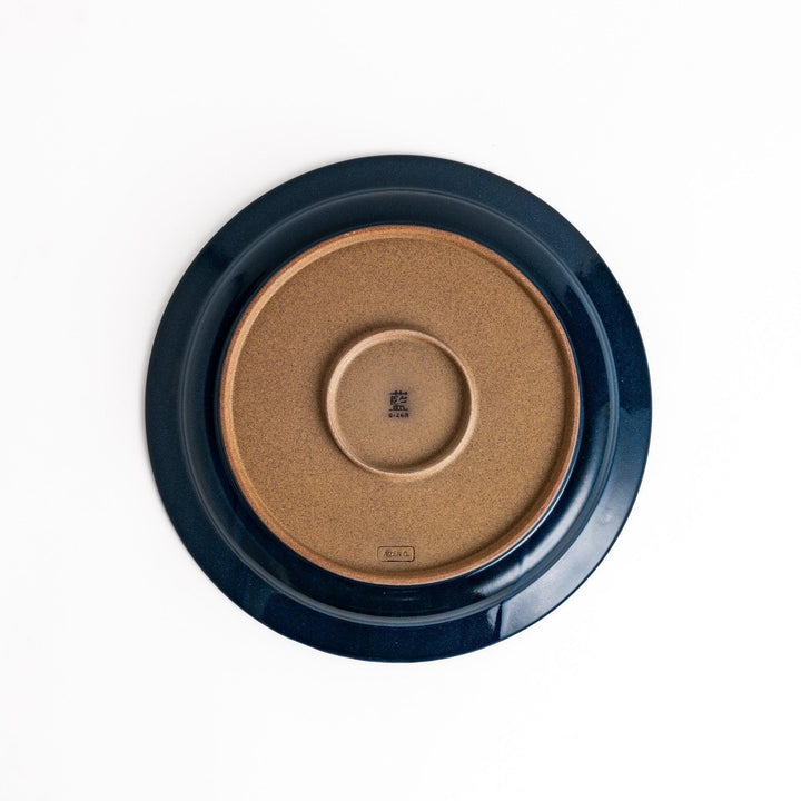 Blue ceramic dinner plate with a glossy finish, featuring a deep, calming tone that complements a modern table setting.