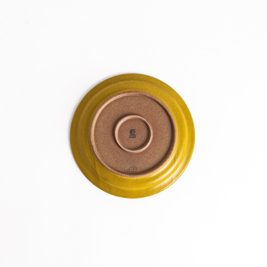 Elegant yellow salad plate with a smooth matte glaze, perfect for presenting salads or side dishes stylishly.
