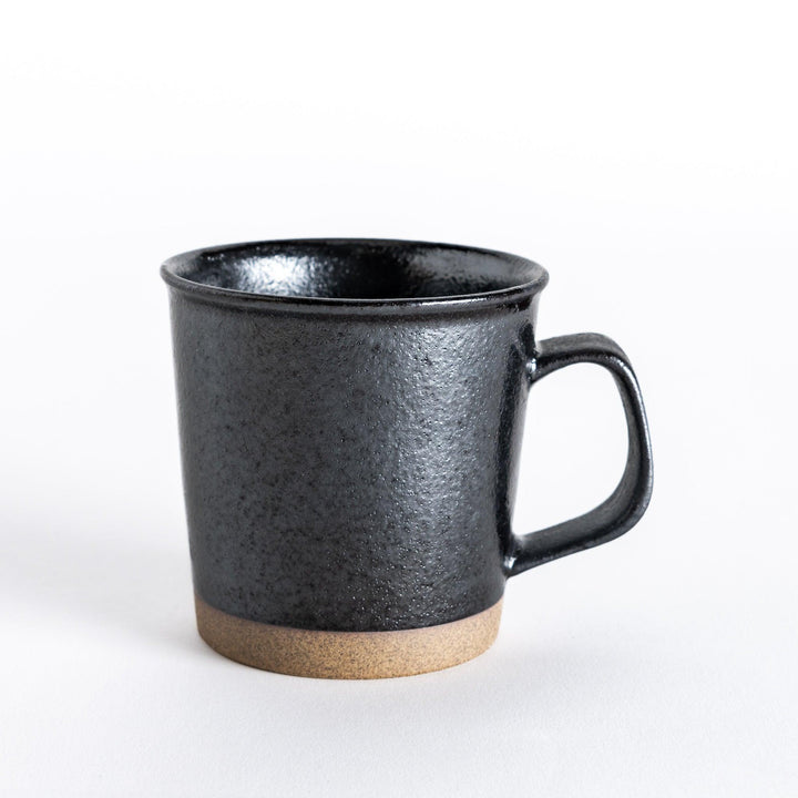 Front view of a black ceramic mug with a neutral-toned base, ideal for hot beverages.