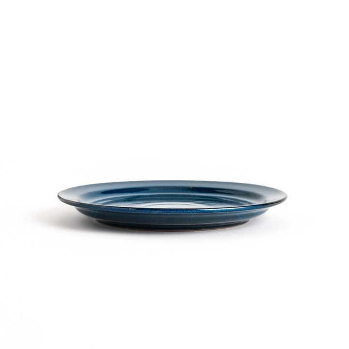 Elegant blue salad plate with a smooth matte glaze, perfect for presenting salads or side dishes stylishly.